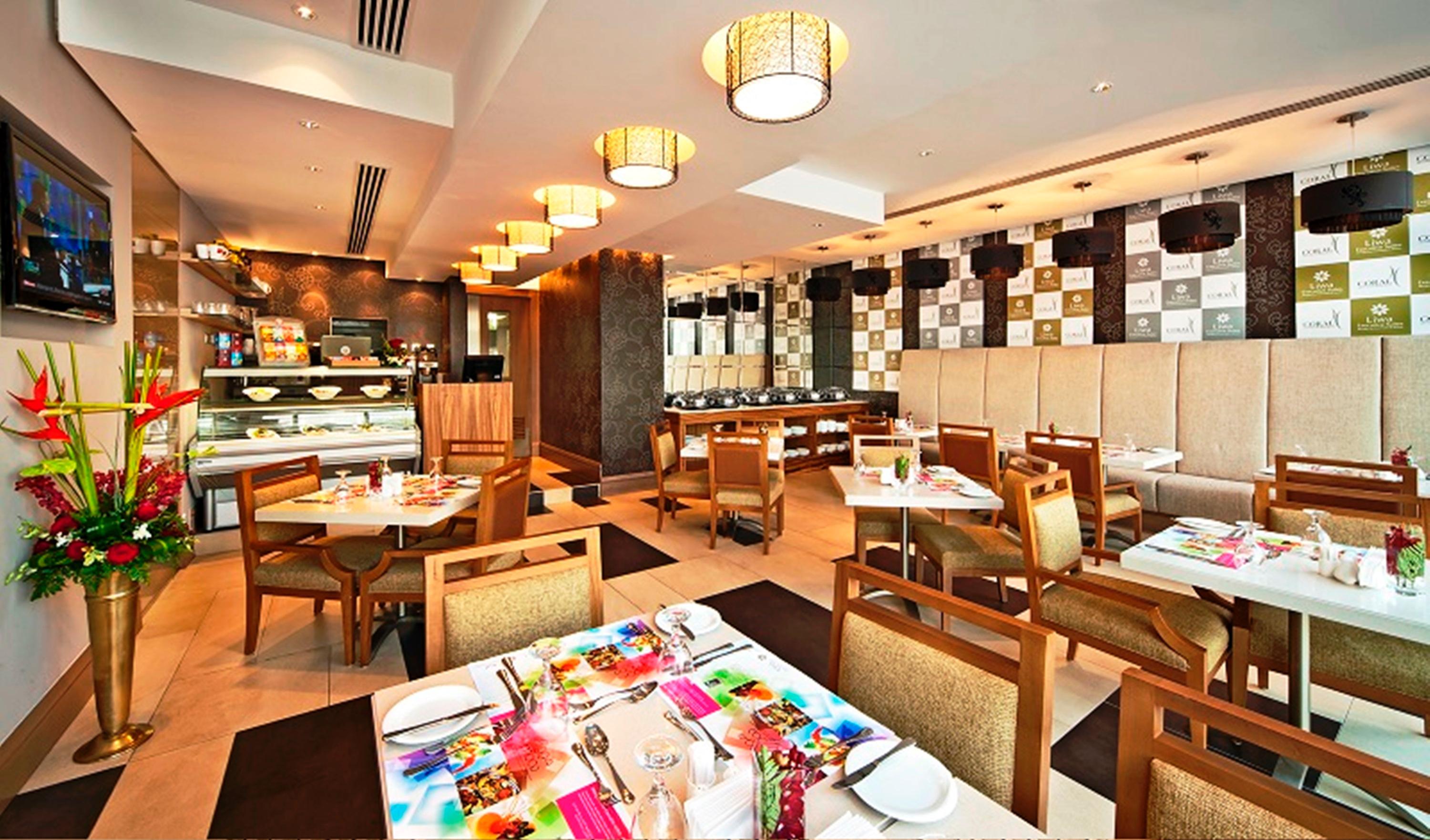 Oaks Liwa Executive Suites Αμπού Ντάμπι Εστιατόριο φωτογραφία